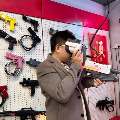 Bom preço Virtual Reality Gun Shooting Game Machine, Experiência Imersiva de Arma VR para Adultos on-line