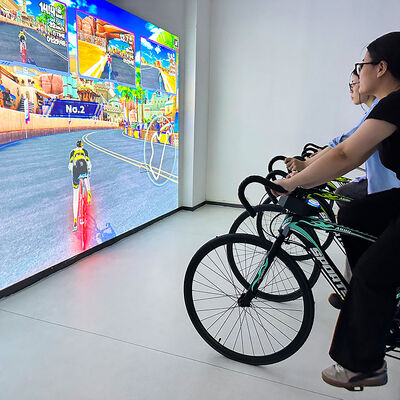 Bom preço Bicicleta de projeção interativa com brilho de 3.500 lúmens e resolução de 1.280 * 800 para centros de jogos e academias com garantia de 1 ano on-line